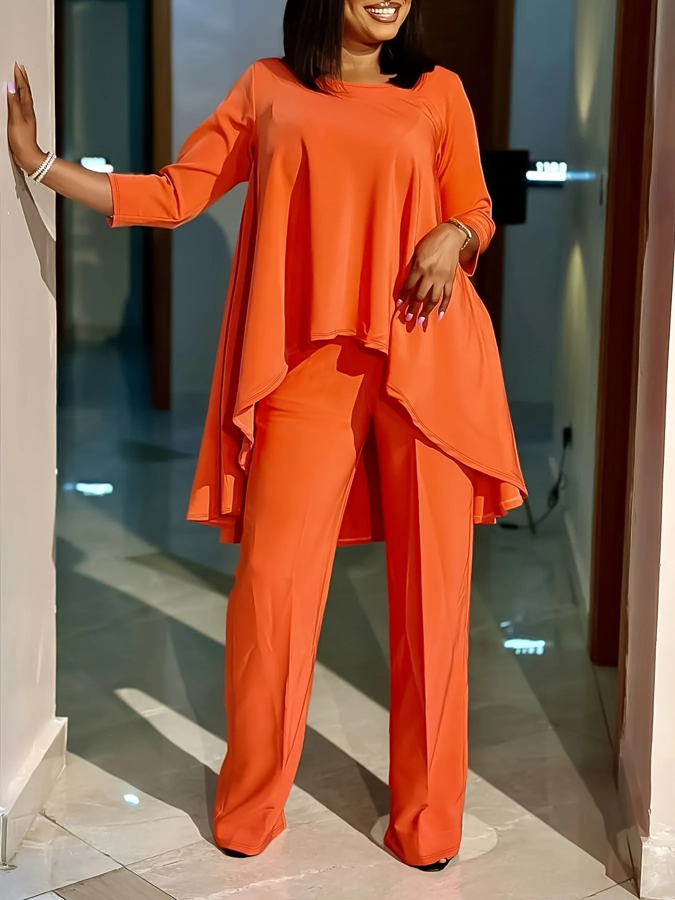 "Curve Comfort: Plus Size Solid Two-Piece Set - Long Sleeve Round Neck Tunic Top & Pants Ensemble for Casual Chic"